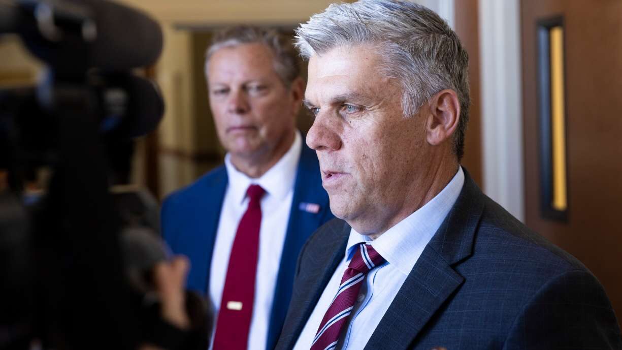 Governor candidate Phil Lyman makes a statement with Layne Bangerter at the 3rd District Court in W...