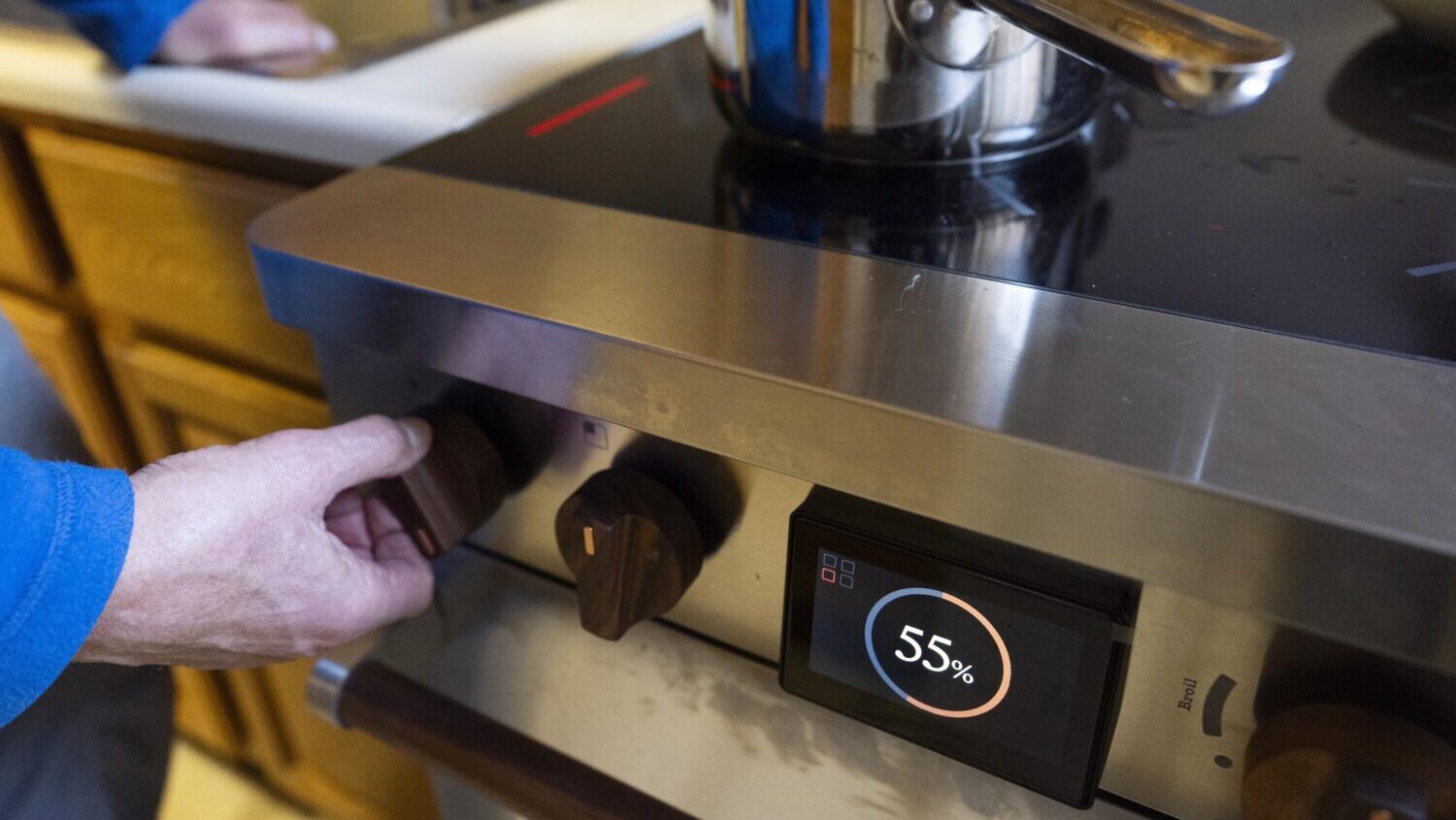 Ed Yaker boils water on a Copper stove, an electric induction stove, on Feb. 10, 2025, in New York....