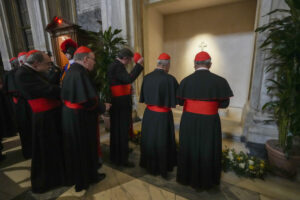 Cardinals visit the tomb of the late Pope Francis inside St. Mary Major Basilica in Rome, Sunday, April 27, 2025. (AP Photo/Andrew Medichini)