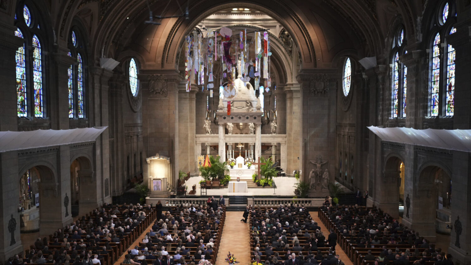 Attendees take their seats before funeral services for Mark and Melissa Hortman at the Basilica of ...