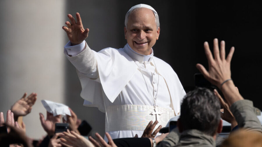 VATICAN CITY, VATICAN - MAY 18: Pope Leo XIV waves as he arrives ahead of the Inauguration Mass of ...