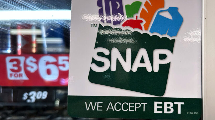 FILE - SNAP EBT information sign is displayed at a gas station in Riverwoods, Ill., Saturday, Nov. ...