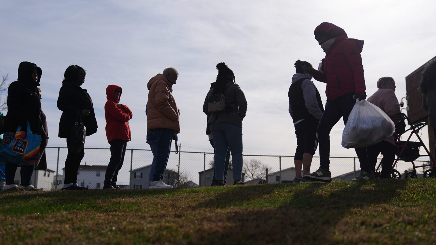 People wait in line durning an emergency food distribution at The Jewish Federation of Greater Phil...