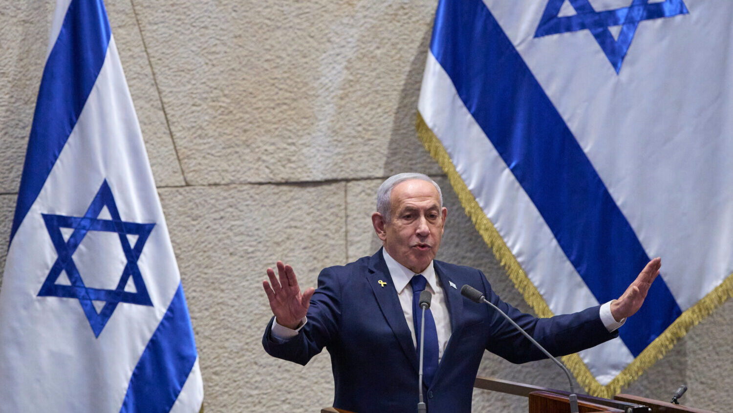 Israel's Prime Minister Benjamin Netanyahu addresses lawmakers in the Knesset, Israel's parliament,...