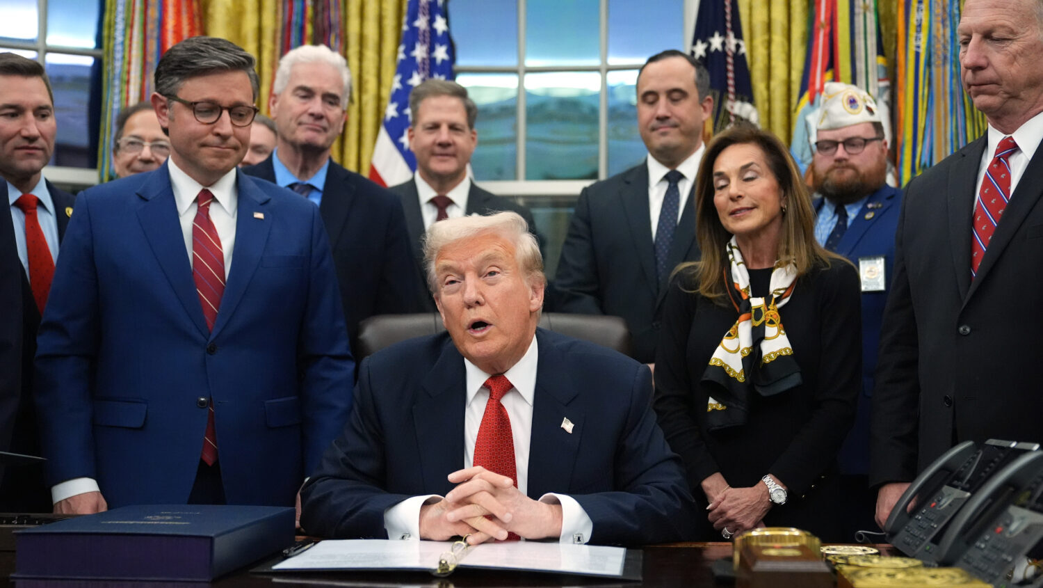President Donald Trump speaks before signing the funding bill to reopen the government, in the Oval...