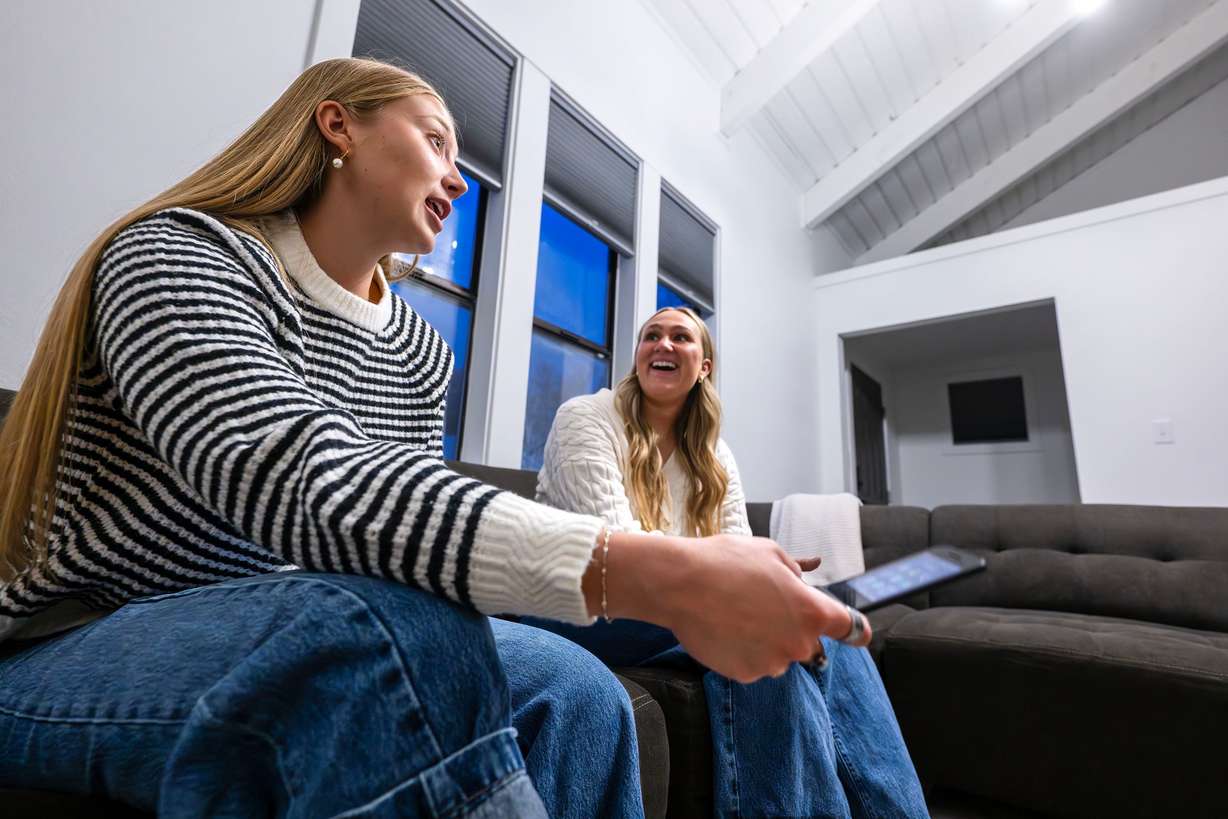 BYU students Katrina Hafen and roommate Alexa Plyer talk about a decision they and another roommate, Hallie Martinson, made to do away with their smartphones for a time. Katrina and Alexa talked on Sunday, Nov. 30, 2025, at their apartment in Provo about the positives and negatives of the decision. | Scott G Winterton, Deseret News