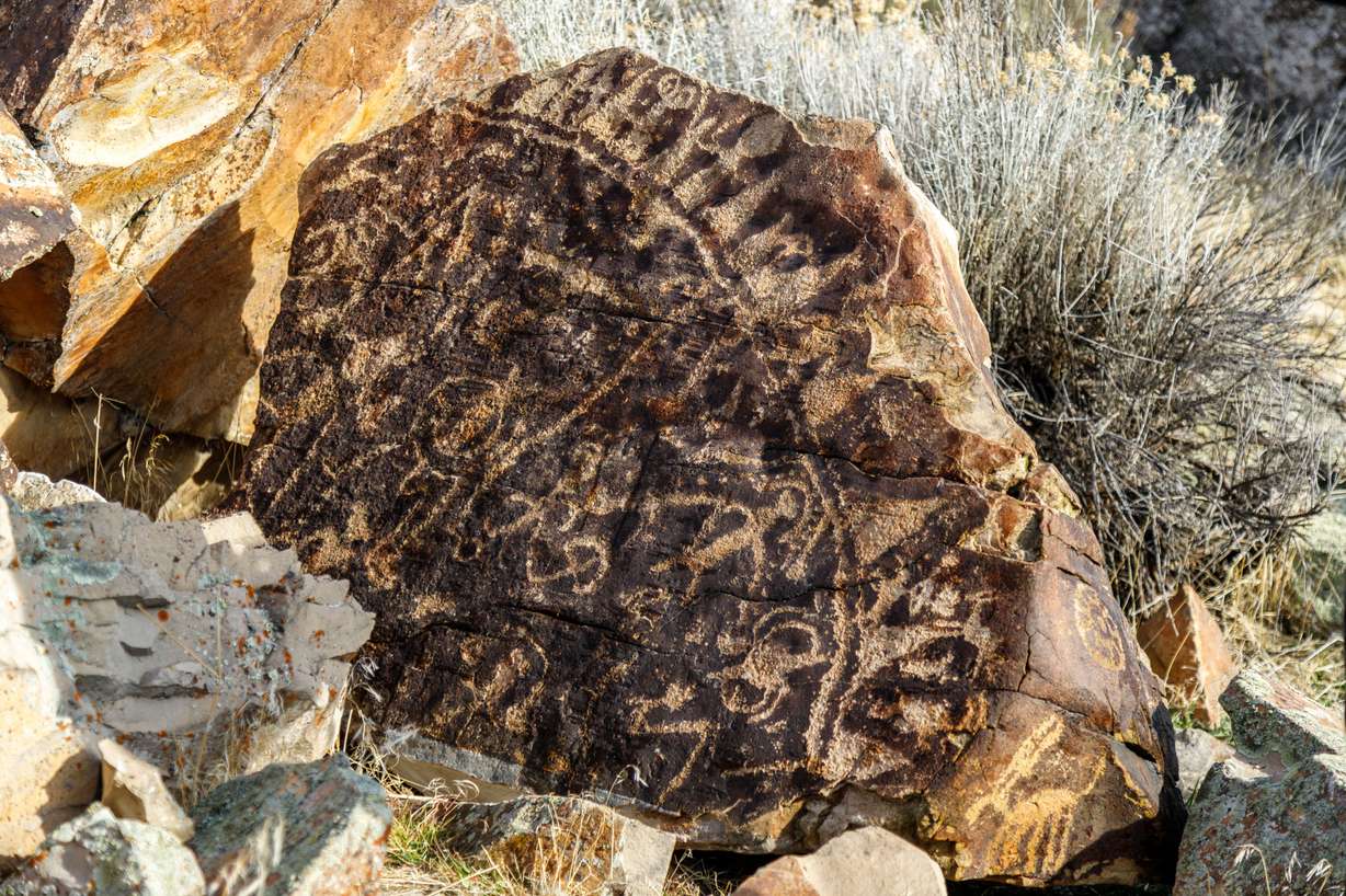 A petroglyph rock was repatriated to its place of origin near the Utah-Idaho border on Dec. 11.