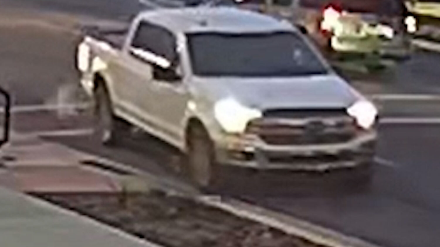 Surveillance footage shows a white truck striking a cyclist on 300 West in Salt Lake City near Hope...