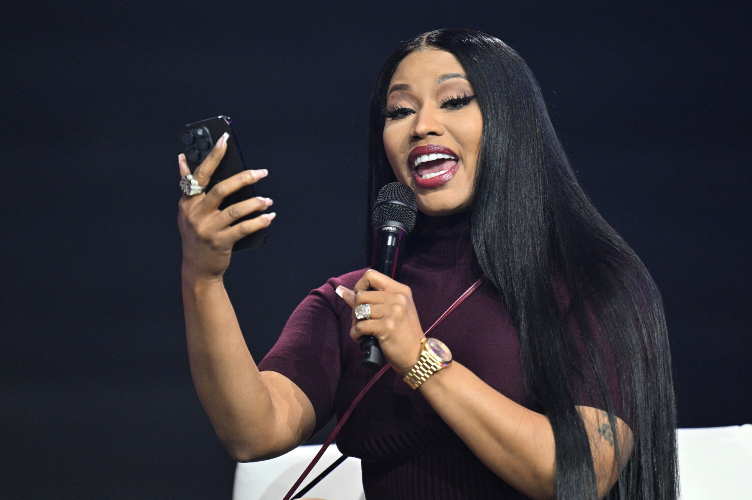 Nicki Minaj speaks during Turning Point USA's AmericaFest 2025, Sunday, Dec. 21, 2025, in Phoenix. ...