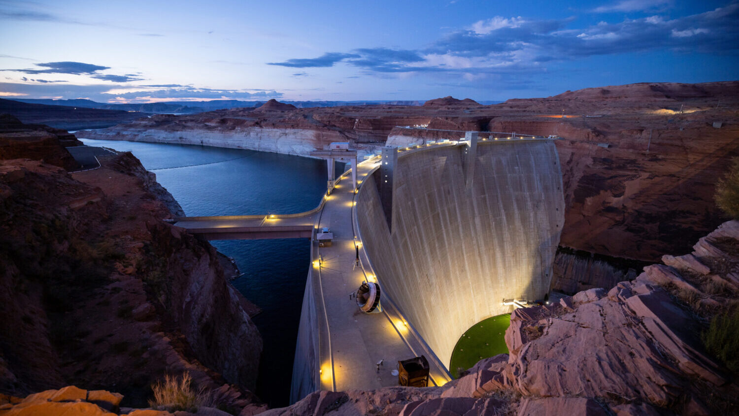 Glen Canyon Dam holds back Lake Powell in Page, Ariz., on Monday, July 18, 2022. (Photo credit: Spenser Heaps, Deseret News)