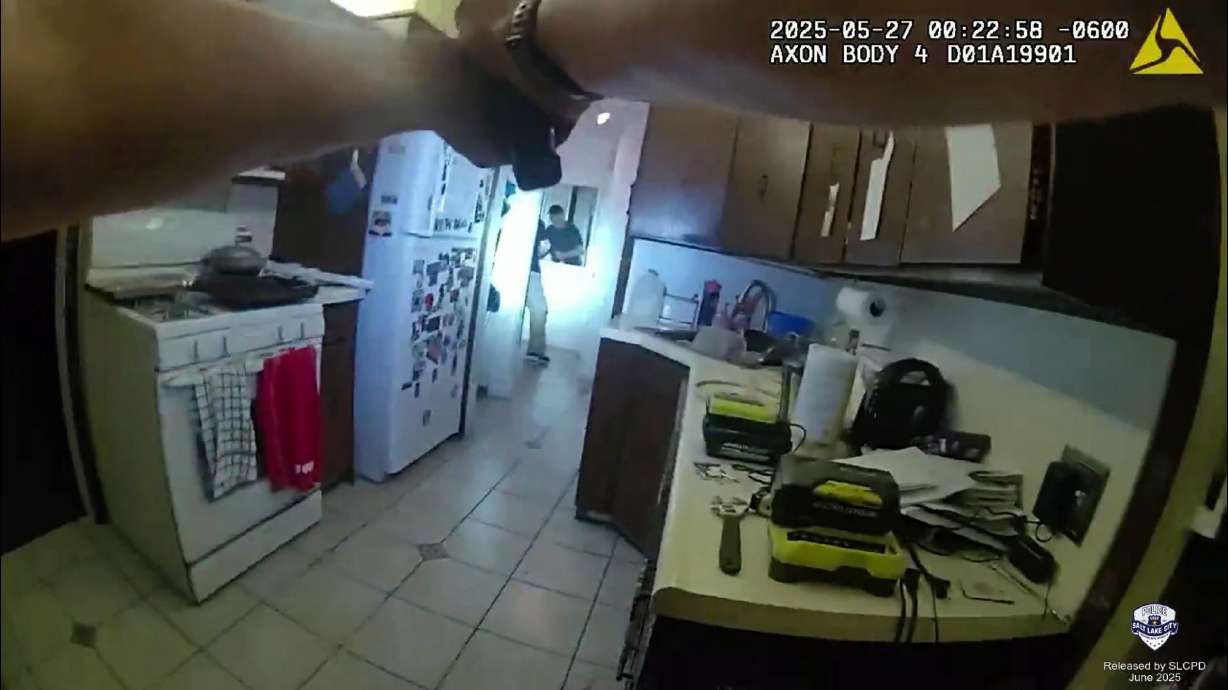 Two Salt Lake police officers who responded to a domestic violence call were found to be legally ju...