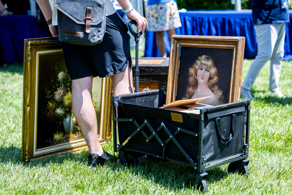 A person waits in line to have paintings appraised as “Antiques Roadshow” makes a stop at Red Butte Garden and Arboretum in Salt Lake City on Tuesday, June 3, 2025. | Isaac Hale, Deseret News