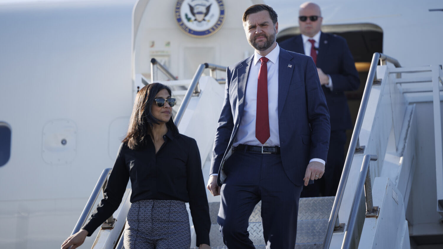 Vice President JD Vance and his wife Usha Vance exit Air Force Two on December 16, 2025 at Lehigh V...