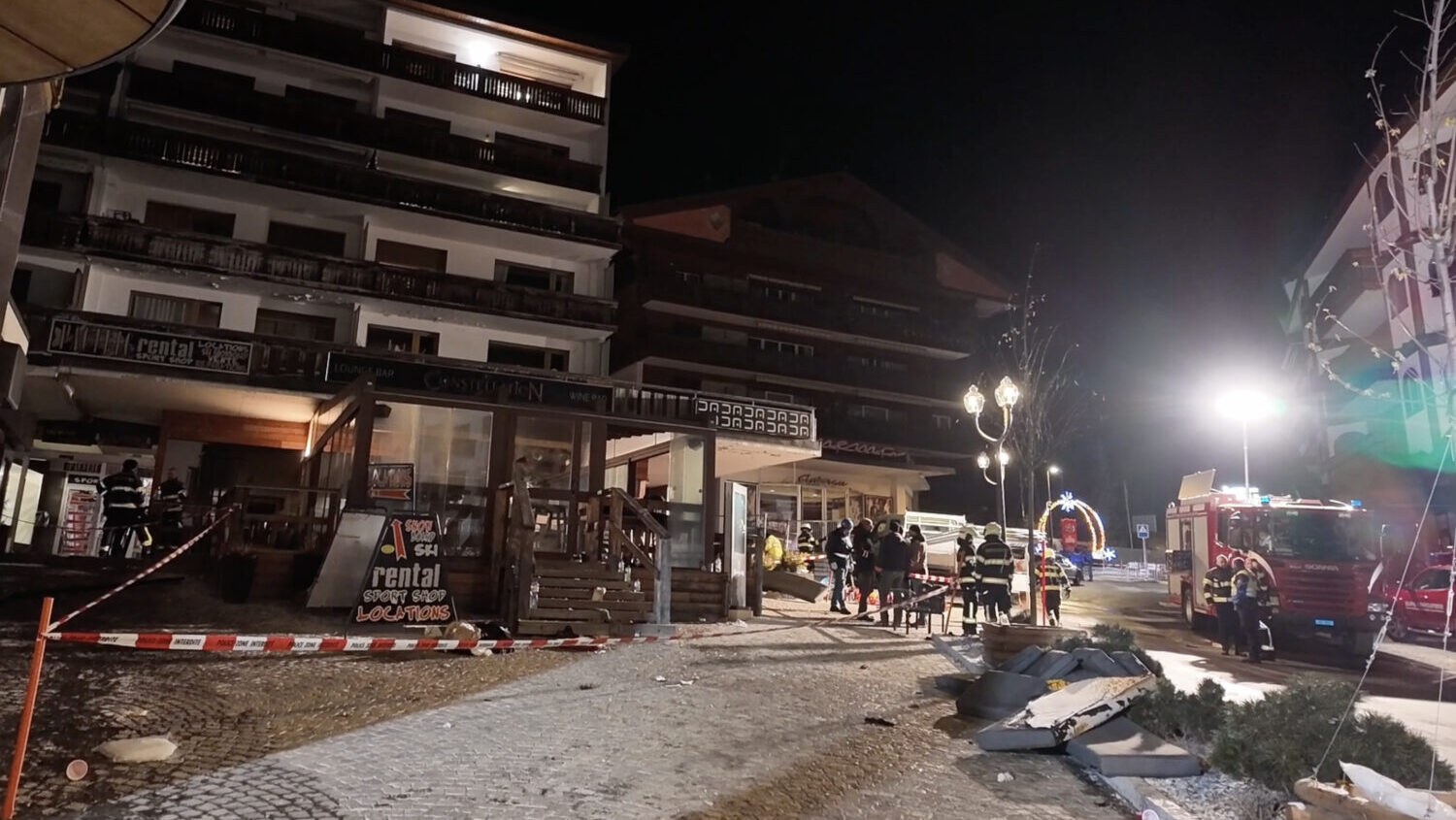 In this screenshot from a video provided by the Valais Cantonal Police, emergency workers respond t...