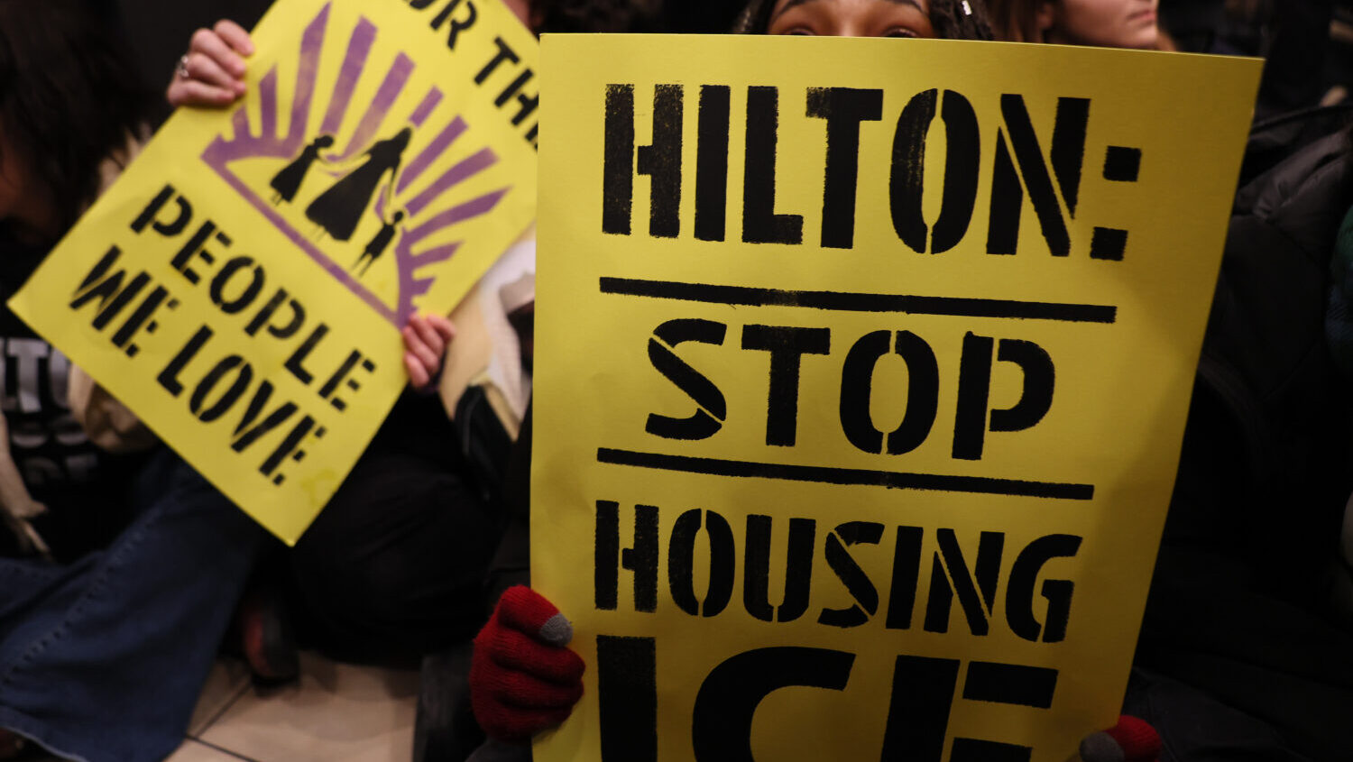 Immigration rights activists stage a sit-in at the Hilton Garden Inn on January 27, 2026 in New Yor...