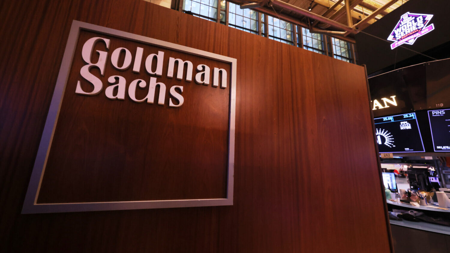 The Goldman Sachs logo is seen at the New York Stock Exchange during morning trading on August 25, ...