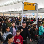 APTOPIX Travel Delays