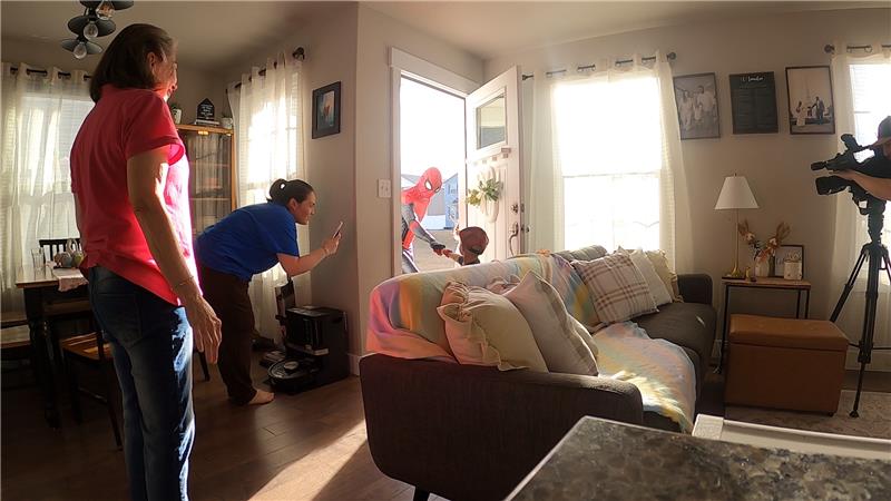 Mateus opened the door to see Spider-Man at his home in Eagle Mountain.