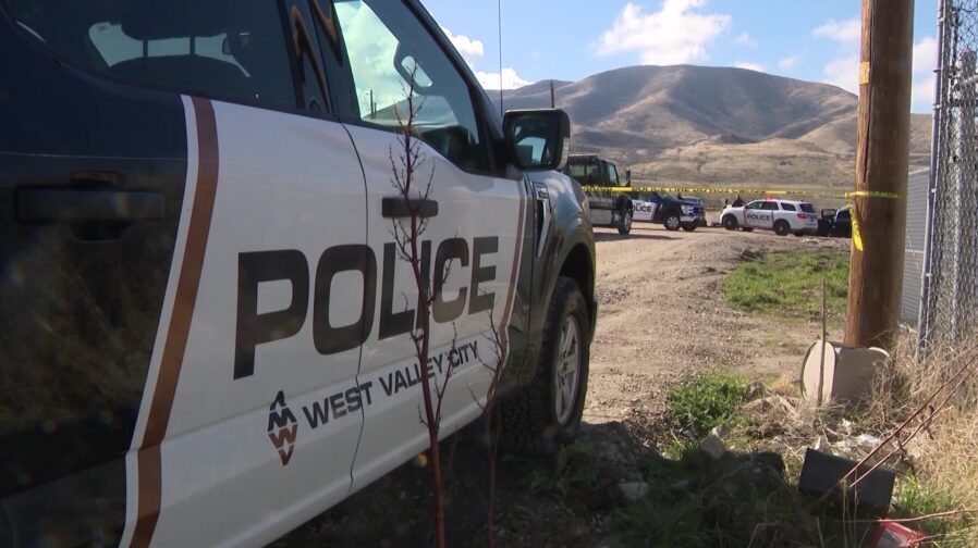 Police investigate the scene of a deadly rollover crash in West Valley City involving students from...