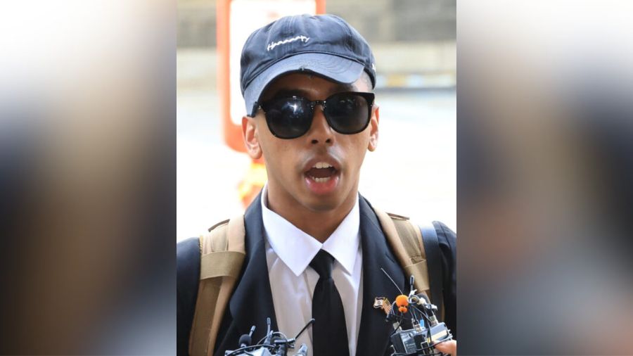 American YouTuber Johnny Somali speaks to reporters as he arrives at the Seoul Western District Cou...