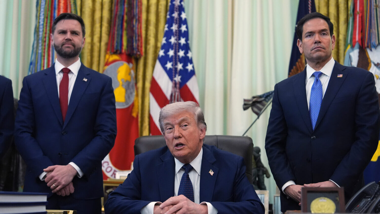 President Donald Trump speaks as Secretary of State Marco Rubio, right, and Vice President JD Vance...
