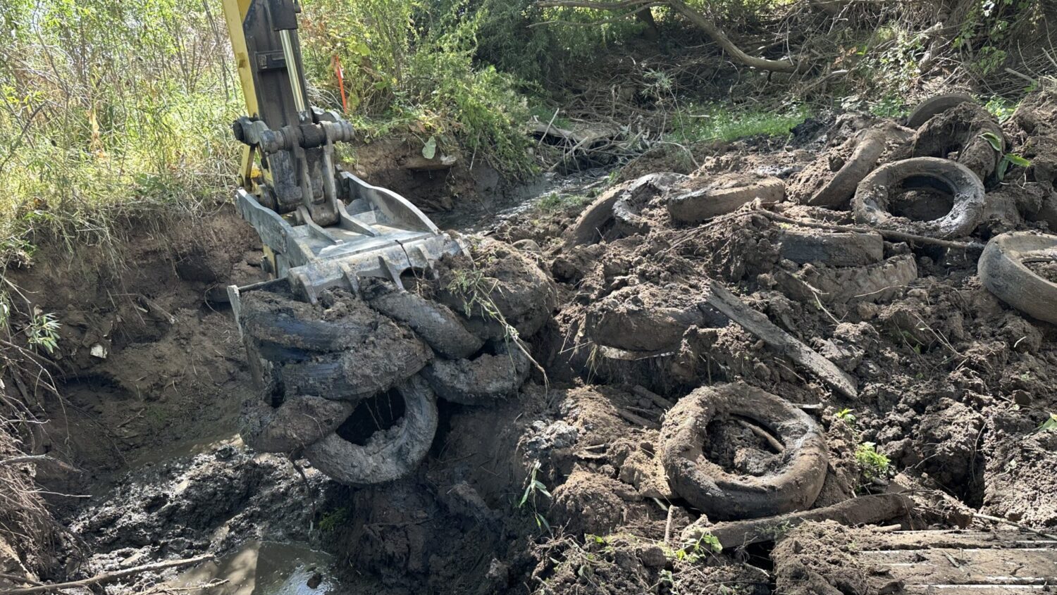 Piles of old tires were among the debris, pulled from the banks of the Logan River. (Photo Courtesy...