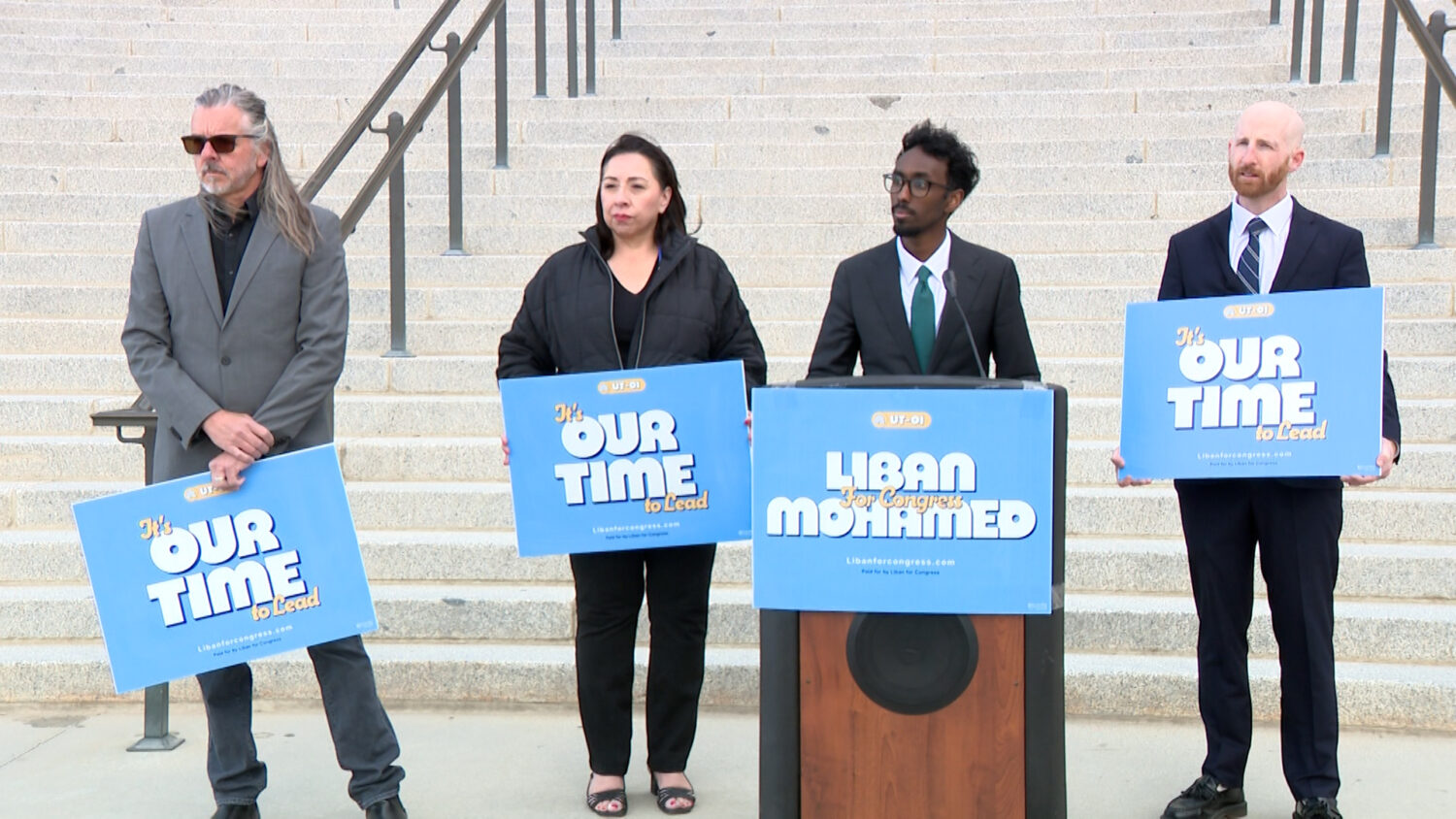 Liban Mohamed speaks at a news conference on April 22, 2026 alongside Mitchell Vice, House Minority Leader Angela Romero, and former state Sen. Derek Kitchen. (Greg Anderson, KSL)