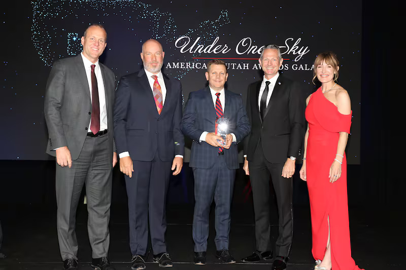 Steve Miller and Steve Starks accept the Under One Sky Award on behalf of the Larry H. Miller Company during the Salt Lake Chamber's "Under One Sky America250 Utah Awards Gala" at the Grand America Hotel in Salt Lake City on Thursday, May 21, 2026. 