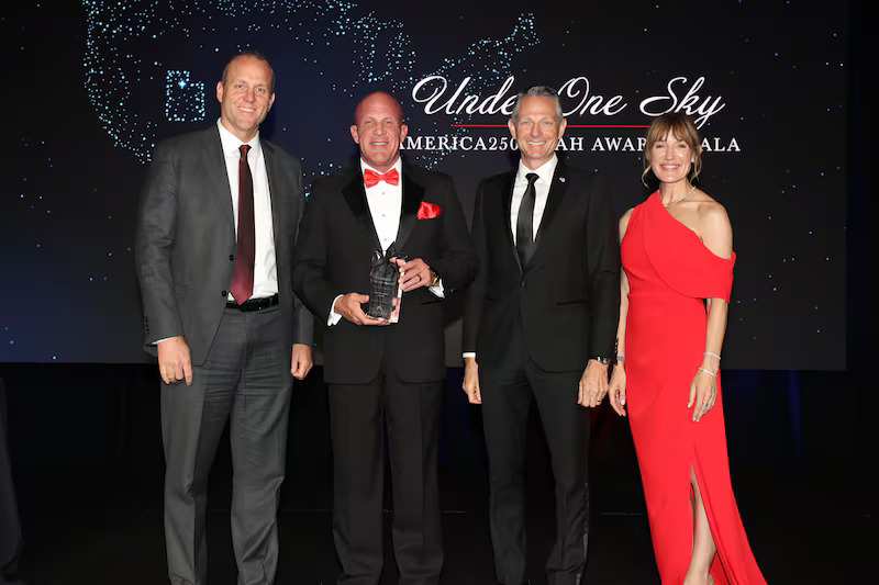 Rob Allen accepts the Steward of the Sky Award on behalf of Intermountain Health during the Salt Lake Chamber's "Under One Sky America250 Utah Awards Gala" at the Grand America Hotel in Salt Lake City on May 21, 2026. (