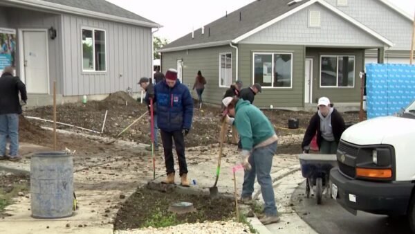 Gov Spencer Cox joined dozens of volunteers in Tooele Monday morning to develop landscaping around ...