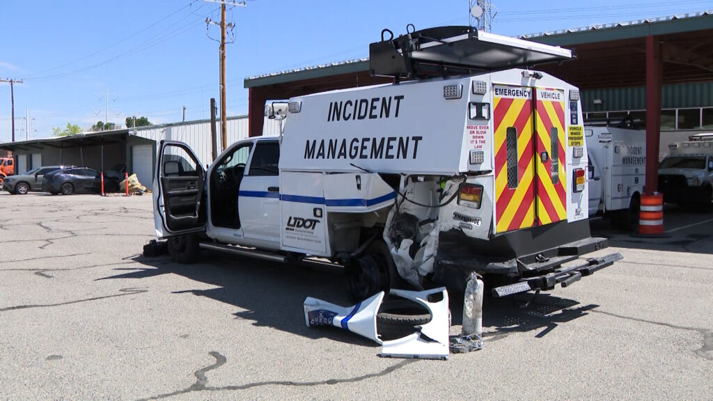 Brad Aven's damaged UDOT vehicle after it was hit by another drive on I-15 in Bountiful on Monday. ...