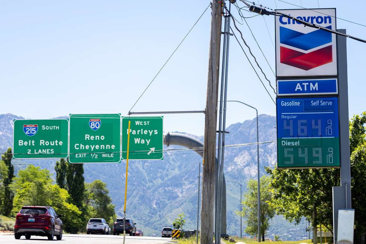 Cars drive past a Chevron on Foothill Drive in Salt Lake City on Monday. Experts warn a steep drop in gas prices will take time, despite the U.S. and Iran signing a deal to end the war in the Middle East. (Photo: Rio Giancarlo, Deseret News)