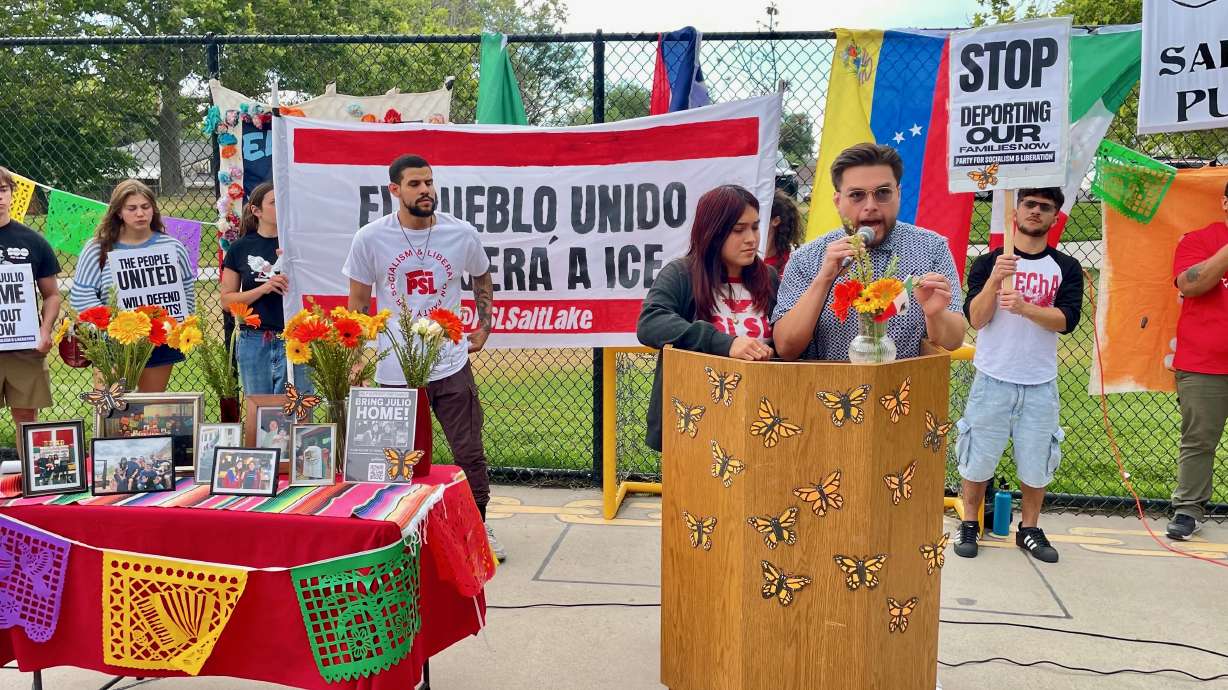 Julio Irungaray Jr. speaks with sister Chantal Irungaray beside him at a rally Thursday in Sherwood...