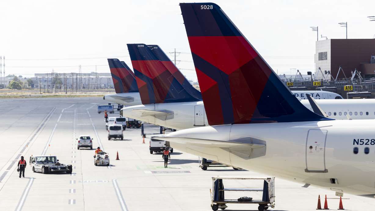 Delta planes at the Salt Lake City International Airport in Salt Lake City on Sept. 12, 2024. Nearl...