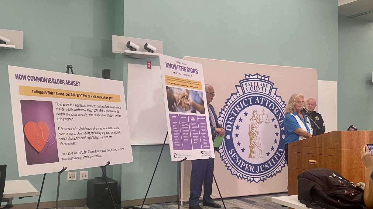 Salt Lake County District Attorney Sim Gill is joined by Debbie Hall, director at Adult Daycare at ...