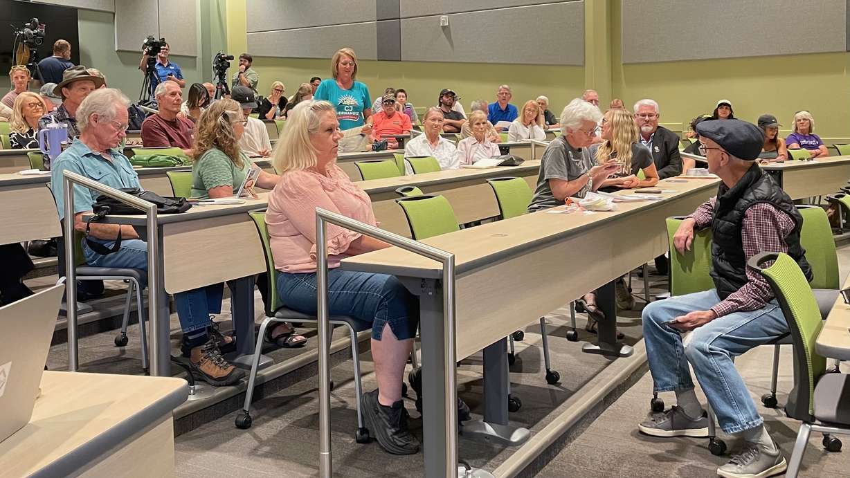 A woman speaks at a forum on the controversial Box Elder County data center plans on Tuesday at the Utah State University Brigham City campus. (Photo: Tim Vandenack, KSL.com)