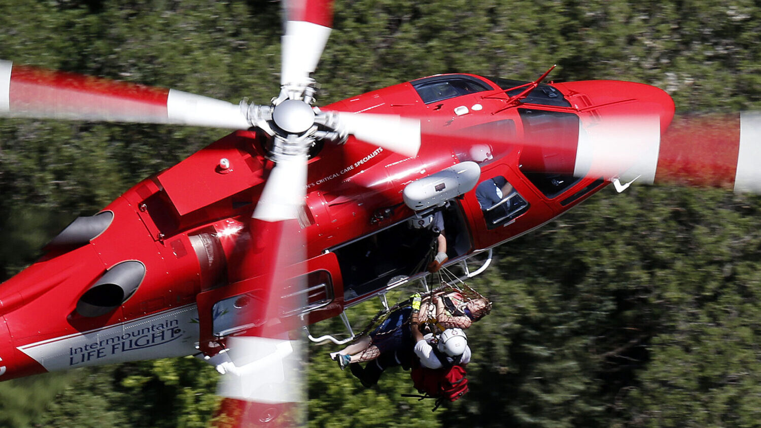 An 18-year-old female is hoisted by Life Flight after falling at Lisa Falls in Little Cottonwood Canyon and being rescued by SAR teams on Wednesday, July 6, 2016.