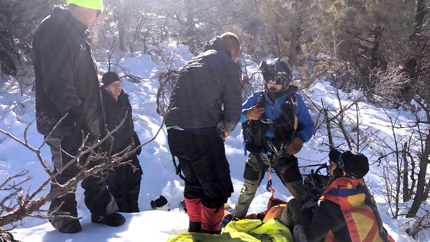 Utah Department of Public Safety prepare to hoist a victim with the help from Washington County SAR Monday, Jan. 10, 2022. Deputies hike in the last mile to reach a woman stuck in the snow in the Kolob Canyons region of Zion National Park. (Washington County Sheriff's Search and Rescue)