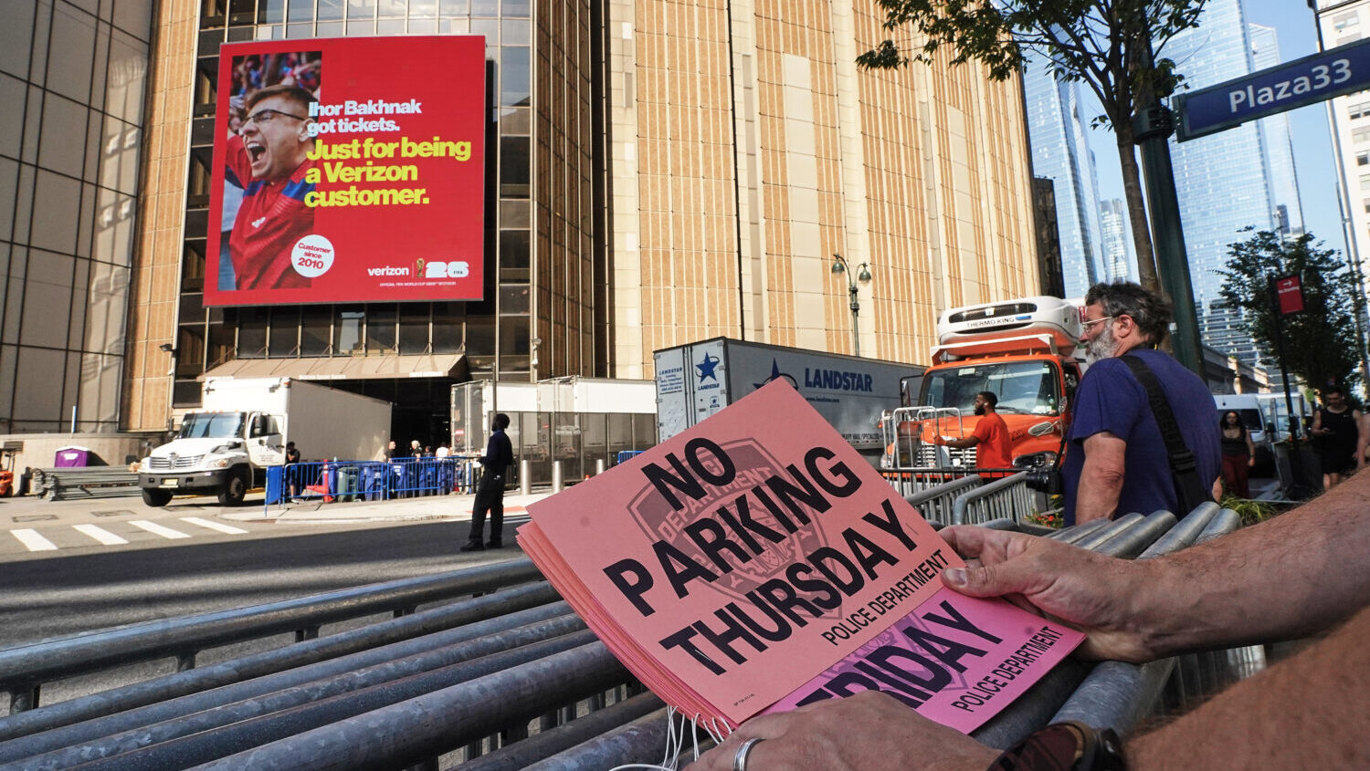 Scores of Taylor Swift fans and and other passersby braved the New York City heat Thursday to satiate their curiosity about what many are calling the wedding of the century.