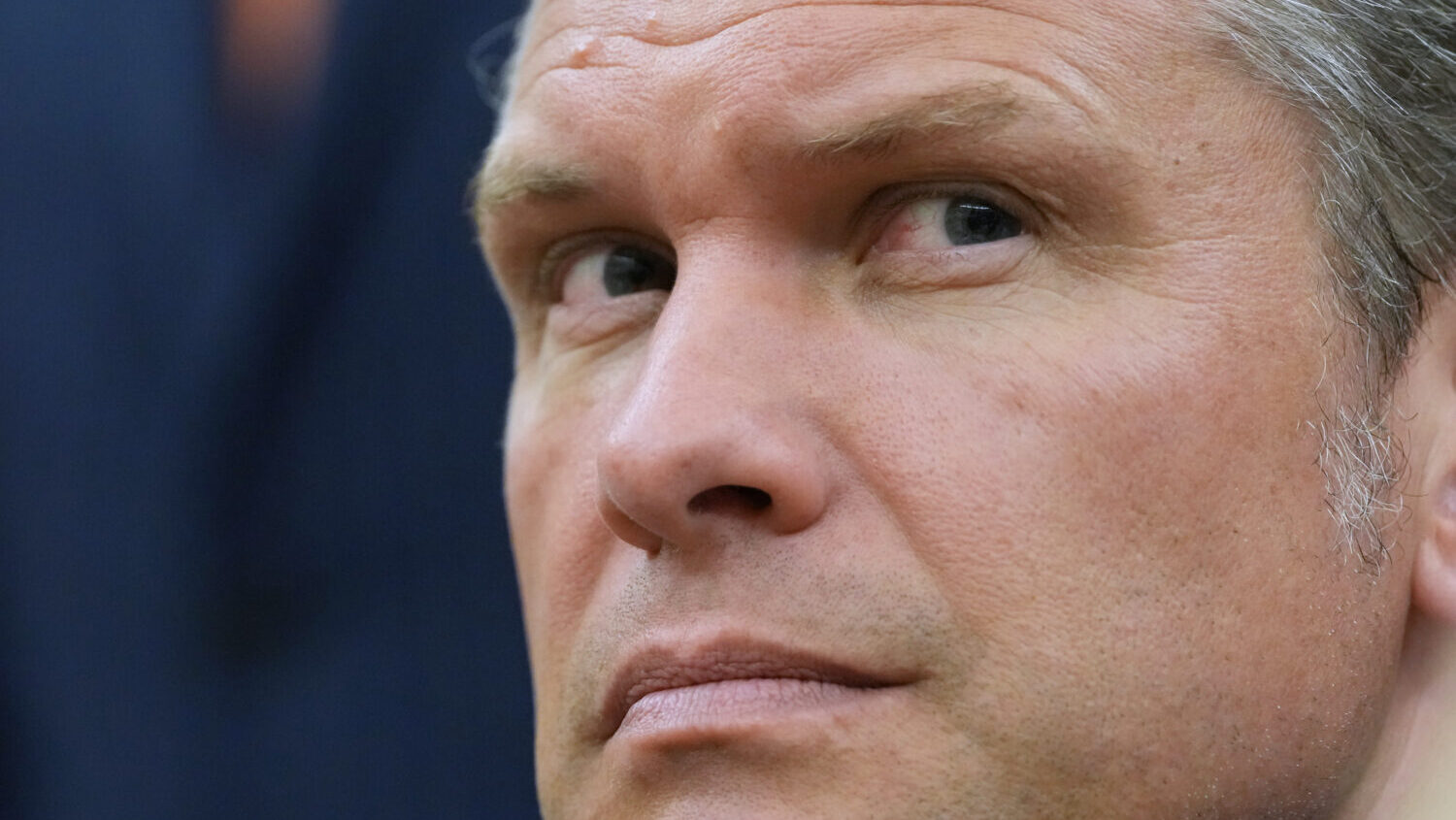 Secretary of Defense Pete Hegseth listens as President Donald Trump meets with Iraq's Prime Ministe...
