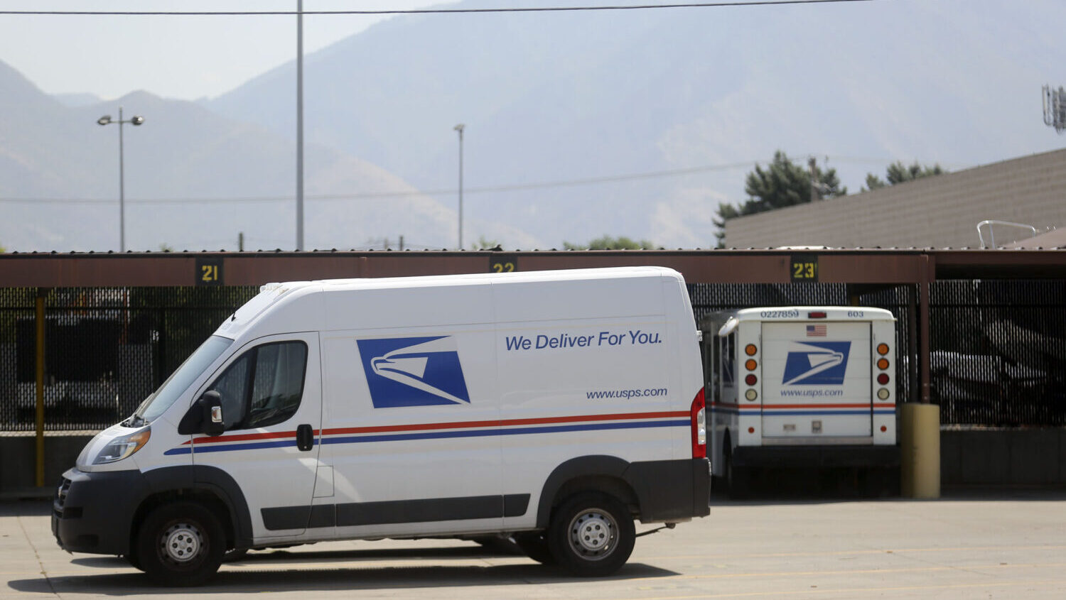 U.S. Postal Service vehicles are parked outside of the post office in South Salt Lake on Tuesday, Aug. 18, 2020. (Kristin Murphy, Deseret News)