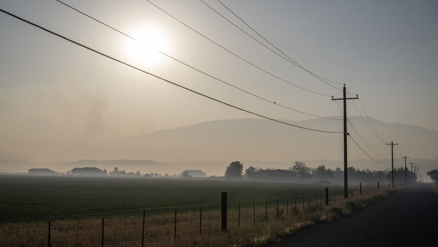 Smoke from the Cottonwood Fire spreads over the town of Beaver on Wednesday, July 1, 2026. (Scott G Winterton, Deseret News)