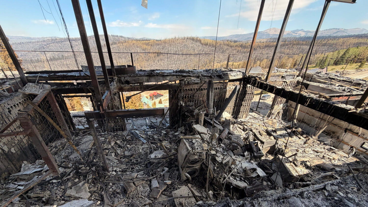 Charred remains of houses and vehicles are all that is left in Eagle Point Resort’s West Village outside of Beaver after the Cottonwood Fire torched much of the area. (Photo credit: Steve Mayer)