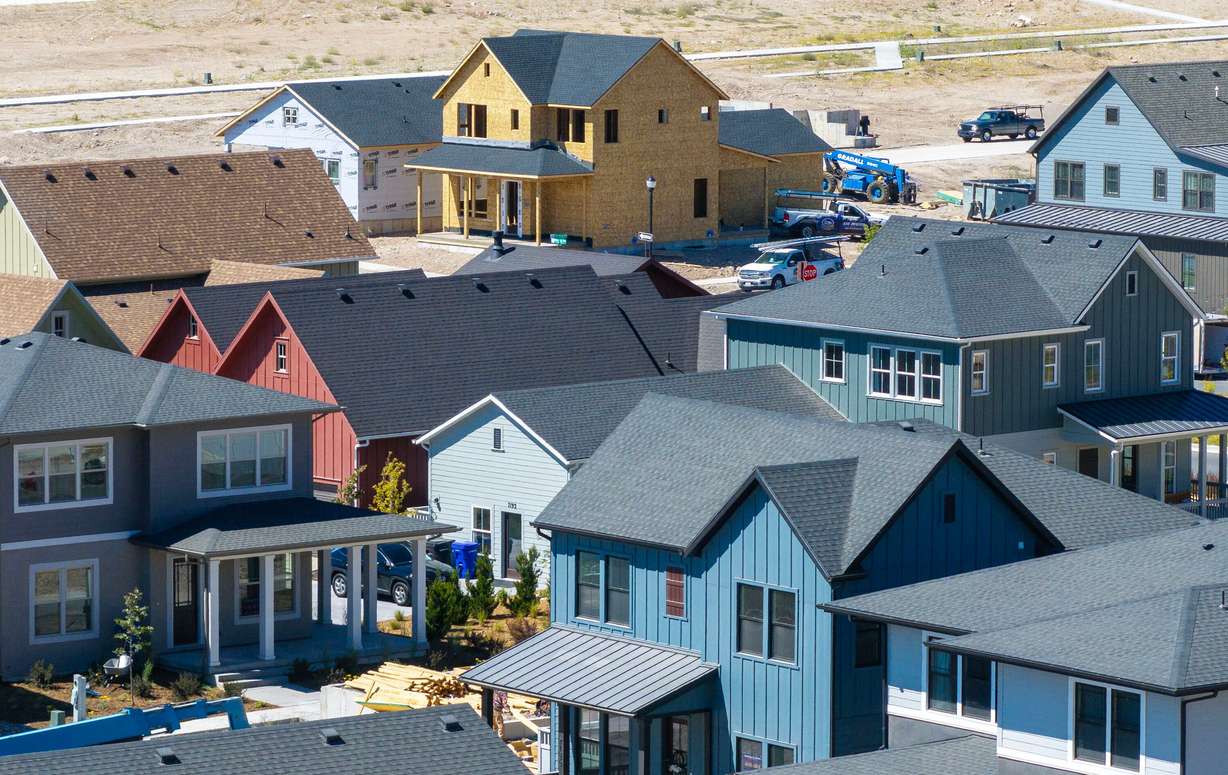 Workers build homes in West Jordan on August 11, 2025. (Photo: Scott G Winterton, Deseret News)
