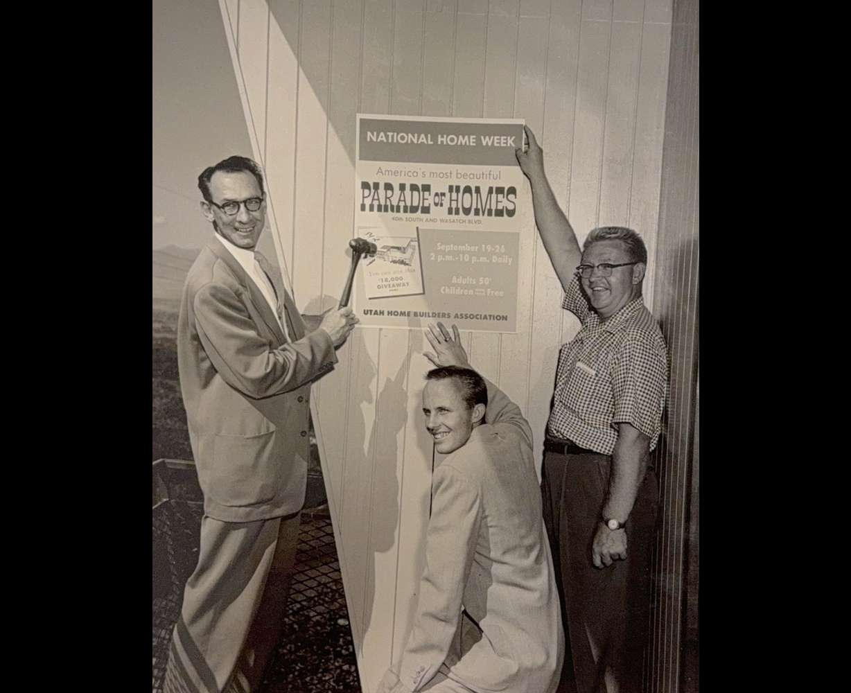 Builders install a Parade of Homes sign during the 1954 Salt Lake Parade of Homes. The 1954 event is the earliest Parade of Homes extensively documented by the Salt Lake Home Builders Association. (Photo: Salt Lake Home Builders Association)