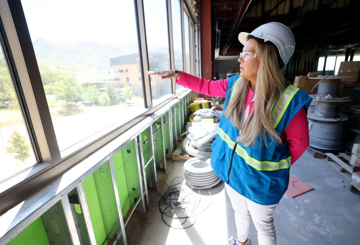 Christena Huntsman Durham, Huntsman Family Foundation director, executive vice president and vice chair, and Huntsman Mental Health Foundation CEO, looks out from the future Utah Mental Health Translational Research Building at the University of Utah Huntsman Mental Health Institute in Salt Lake City on June 18. (Photo: Kristin Murphy, Deseret News)
