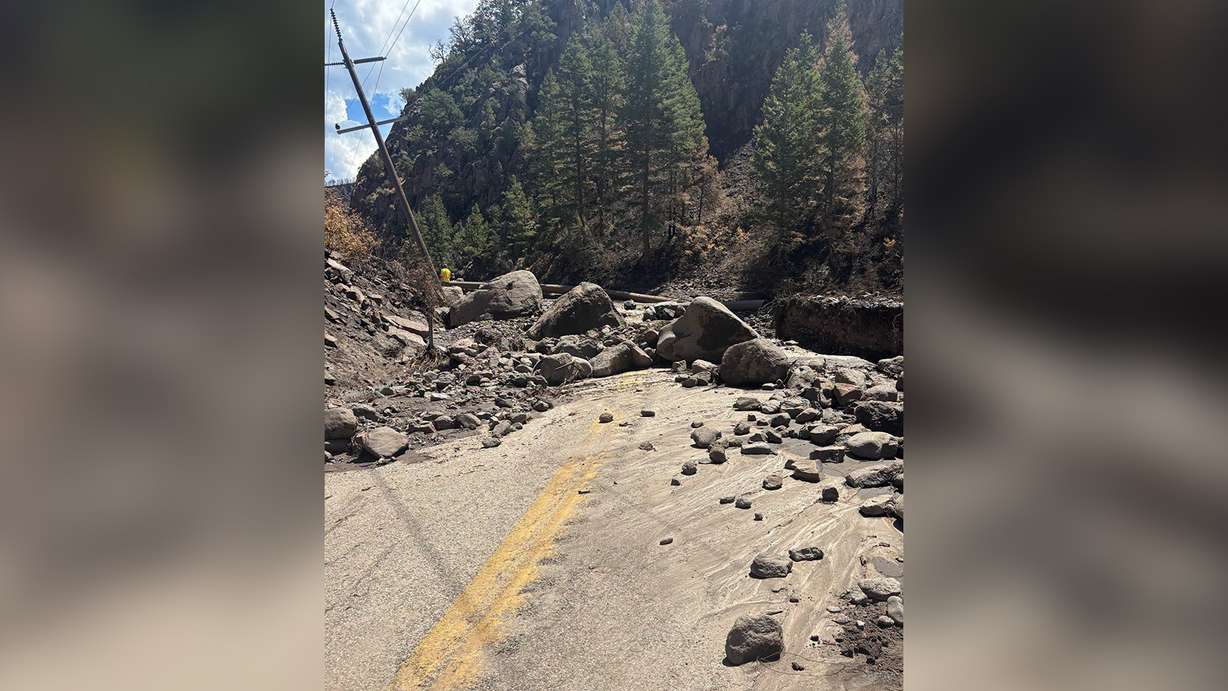 Boulders and mud cover a section of state Route 153 in Beaver Canyon. Utah Department of Transportation officials said Tuesday that the canyon route is closed indefinitely because of flood damage. (Photo: Utah Department of Transportation)