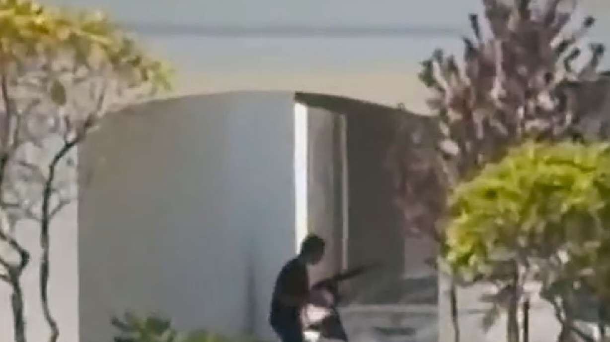 This still image captured from video by a waitress shows the scene of a shooting that started at a ...