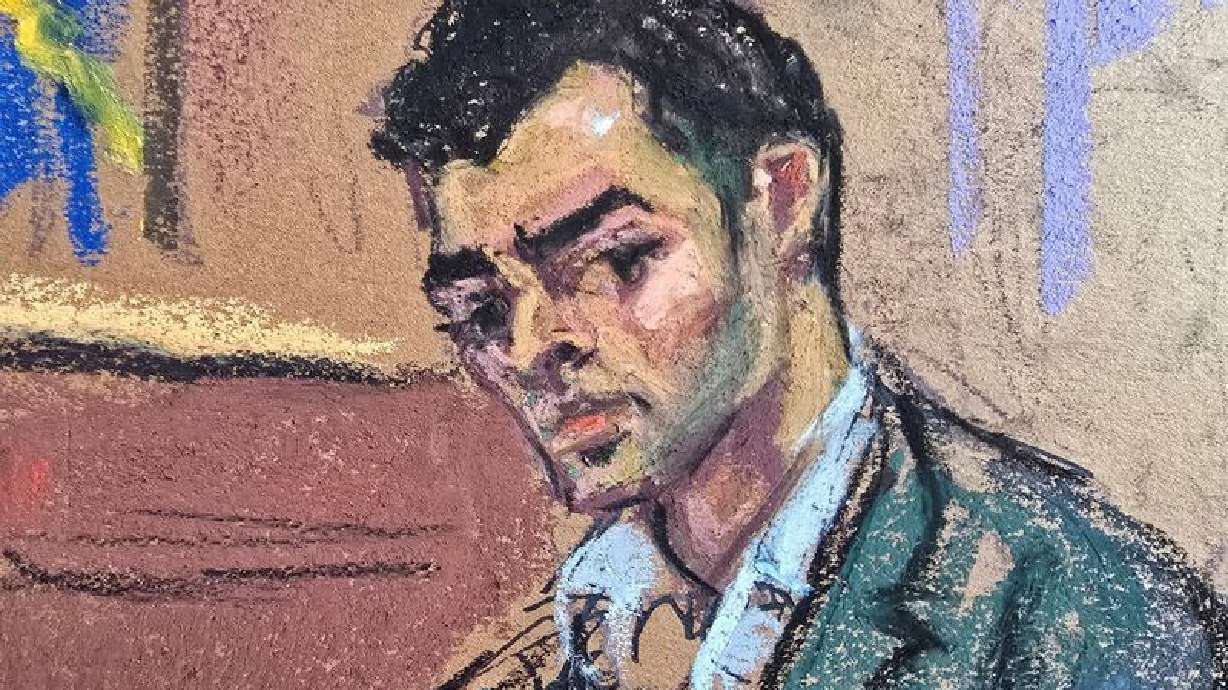 Luigi Mangione, the suspect in the murder of UnitedHealth Group executive Brian Thompson, sits duri...