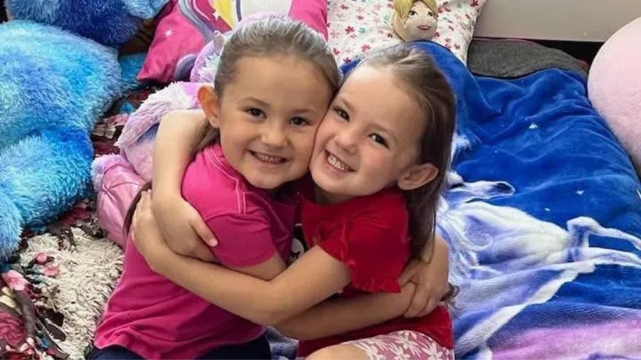 Leneah Taeoalii hugs her sister in this undated family photo. The girls were playing at Willow Pond...